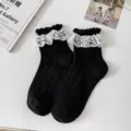 Women's cute black JK Lolita socks with white hollow lace ruffle trim, sweet style cute. - One Size / Black