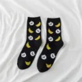 Cute black cotton crew socks featuring fun panda and banana print patterns for daily wear. - One Size / Black