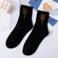 Black mid-tube socks for women with cute brown animal balloon knit pattern, casual cotton daily wear. - One Size / Black