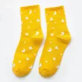 Yellow cotton crew socks featuring white star and moon patterns with metallic glitter design. - One Size / Yellow