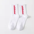 White mid-calf socks with red vertical letter print, stylish streetwear cotton blend socks. - One Size / Crew Socks / White