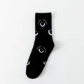 Chaussettes mi-hautes noires en coton pour femmes avec motif visage souriant et lettres. - Taille unique / Noir Avec Motif Sourire Partout