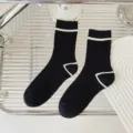 Calzini donna neri in cotone con risvolto a righe bianche e dettagli sul tacco sportivi casual - Taglia unica / Nero con 1 striscia