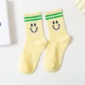 Yellow crew socks with green stripes and cute smiley face design, comfortable cotton socks. - One Size / Yellow