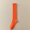 Solid color ribbed calf socks in bright orange, comfortable cotton mid-tube socks for women. - One Size / Orange