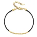 Bracelet minimaliste en perles Miyuki noires et dorées avec fermoir mousqueton et chaîne d'extension. - Noir et Or (SL781)