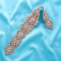 Detailed view of the exquisite rose gold bridal rhinestone applique, featuring sparkling crystals. - Rose Gold