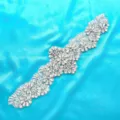 Exquisite bridal rhinestone applique detail shot, sparkling crystals and pearls for wedding dress. - Silver