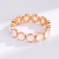 Fashion gold-toned elastic crystal beaded bracelet, elegant white round station hand jewelry. - White Style (SL1025)