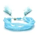Pulsera trenzada ajustable con cuentas de cristal azul claro y borlas multihebra - Estilo Azul Claro (SL079)