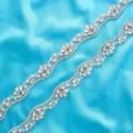 Close-up detail of sparkling rhinestone pearl trim, wavy crystal mesh applique for bridal dress. - 1 Yard / Silver