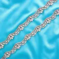 Close up of hand-sewn rhinestone and pearl wavy trim applique, sparkling bridal accessory detail. - 1 Yard / Rose Gold