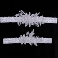 Elegant white lace wedding garter set with floral embroidery and pearl for bridal party. - Gray