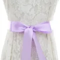 White lace wedding dress with an elegant light purple satin ribbon bow belt at the waist. - With Light Purple Ribbon