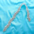 Close-up of sparkling rhinestone applique trim, delicate crystal details for bridal sash decor. - 1 Yard / Silver