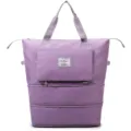 Grand sac de voyage pliable de grande capacite en violet, design impermeable avec couches. - Violet