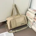 Lightweight canvas travel duffel bag large capacity gym shoulder bag for women daily use. - Apricot