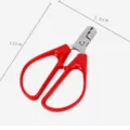 Red melon seed sheller nut cracker, stainless steel and plastic kitchen tool variant. - Red
