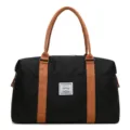 Borsa da viaggio nera di grande capacità con manici marroni e cinturino frontale, borsa bagaglio. - Taglia L / Nero