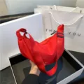 Red nylon crescent dumpling crossbody bag for women, lightweight trendy shoulder underarm bag - Red