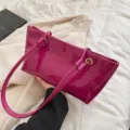 Glänzende Lackleder Umhängetasche, fuchsia Achseltasche Shopper mit Metallringen. - Rosa
