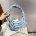 Light blue woven noodle shoulder bag with handmade knotted handle for women casual chic - Blue