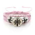 Pink braided leather bracelet featuring a classic Saint Benedict medal charm and metal beads. - Pink Style 5 (JY9762)