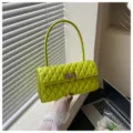Neon green quilted baguette bag for women, stylish underarm shoulder bag with metal lock. - Green