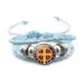 Light blue braided leather bracelet featuring a Saint Benedict medal glass cabochon charm. - Blue Style 2 (JY9762)