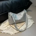 Silberne Schultertasche mit stylischem Knotengriff, ideal für Pendeln und modebewusste Frauen. - Silber