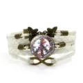 Bracciale in pelle intrecciata multistrato con ciondolo a farfalla simbolo di pace. - Bianco-Stile 2