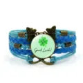 Bracciale in pelle intrecciata multistrato blu con ciondolo in vetro trifoglio e decoro. - modello 3 / Blu