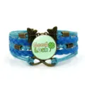 Bracciale in pelle intrecciata multistrato blu con trifoglio Good Luck e ciondoli vintage. - Stile Retrò Quadrifoglio e Libellula / Blu (11)