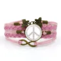Bracciale multistrato in pelle rosa con farfalla vintage e simbolo di pace margherita. - Rosa Stile 7