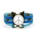 Bracciale in pelle blu intrecciato multistrato vintage con simbolo di pace e farfalla. - Blu Stile 7