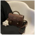 Retro PU leather satchel bag with cute bear embroidery and fluffy doll pendant for women. - Coffee With Charm