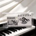 Transparent PVC pencil case stationery set with music notes notebook and piano shaped erasers. - Upgraded Edge-Pull Bag 172 Set (White Note Style)