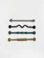 Detailed view of four colorful stainless steel industrial piercing barbells with unique shapes. - Style 6 / Set of 4
