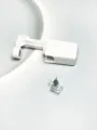 Disposable piercing tool detail view, body piercing auxiliary equipment with blue crystal stud. - White Ear Piercer (Blue Rhinestone)