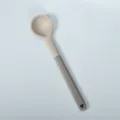 Two-tone silicone cooking spoon with heat-resistant handle for non-stick kitchenware cookware. - Khaki Silicone Solid Spoon with Flat Plastic Handle