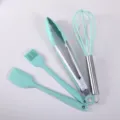 Set of 4 silicone baking tools including spatula, brush, food tongs, and whisk in mint green. - Dark Green 4-Piece Baking Set A