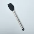 Silicone spatula with stainless steel handle for baking, cake cream, and kitchen use. - Black Silicone Spatula with Hanging Loop