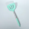 Large mint silicone slotted spatula with stainless steel handle for kitchen cooking. - Dark Green