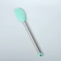 Stainless steel handle silicone spatula in mint green for baking and cake decorating. - Dark Green Silicone Spatula with Hanging Loop
