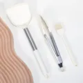 Silicone kitchen utensil set featuring spatula, food tongs, and oil brush in beige. - Three-Piece Set / Off White