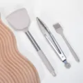 Silicone kitchen utensil set featuring spatula, food tongs and oil brush for cooking non-stick cookware - Three-Piece Set / Khaki