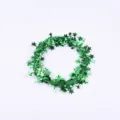 Green star tinsel garland, Christmas wire star vine variant for holiday tree scene decoration. - Green