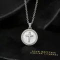 Close-up of the elegant gold-plated cross necklace with sparkling cubic zirconia pendant. - Silver-Copper Plated Rhinestone Cross Necklace