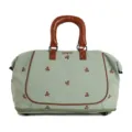 Light green travel duffel bag with brown bow embroidery, handles and stylish trim. - Green