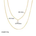 Minimalist double-layer golden necklace with small diamond pendant and size details - Single Rhinestone Double Layer Necklace / Gold